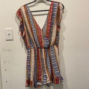 The fall colors romper with tie back. Breezy but great for the south!